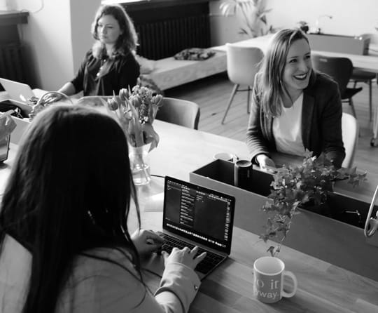 women at a meeting